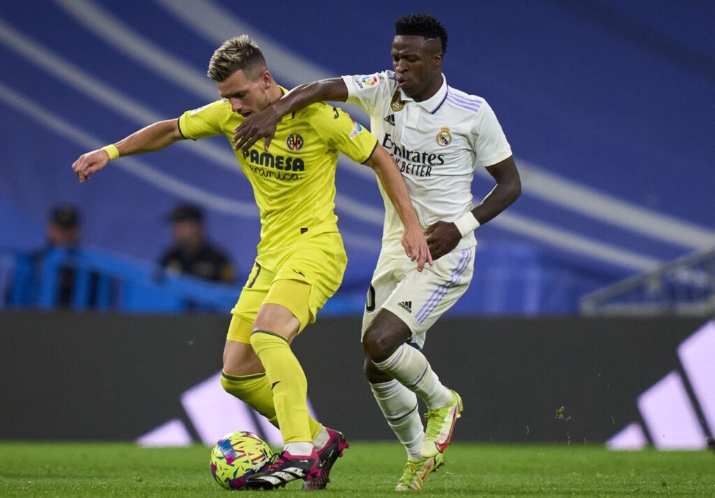 فينيسيوس جونيور وجيوفاني لو سيلسيو خلال مباراة ريال مدريد ضد فياريال (المصدر:Gettyimages)