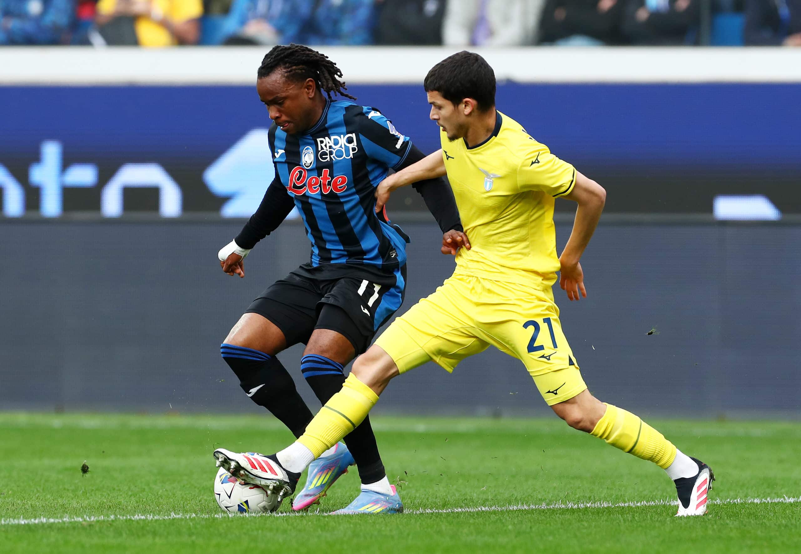 رضا بلحيان - أديمولا لوكمان (المصدر: Getty Images)