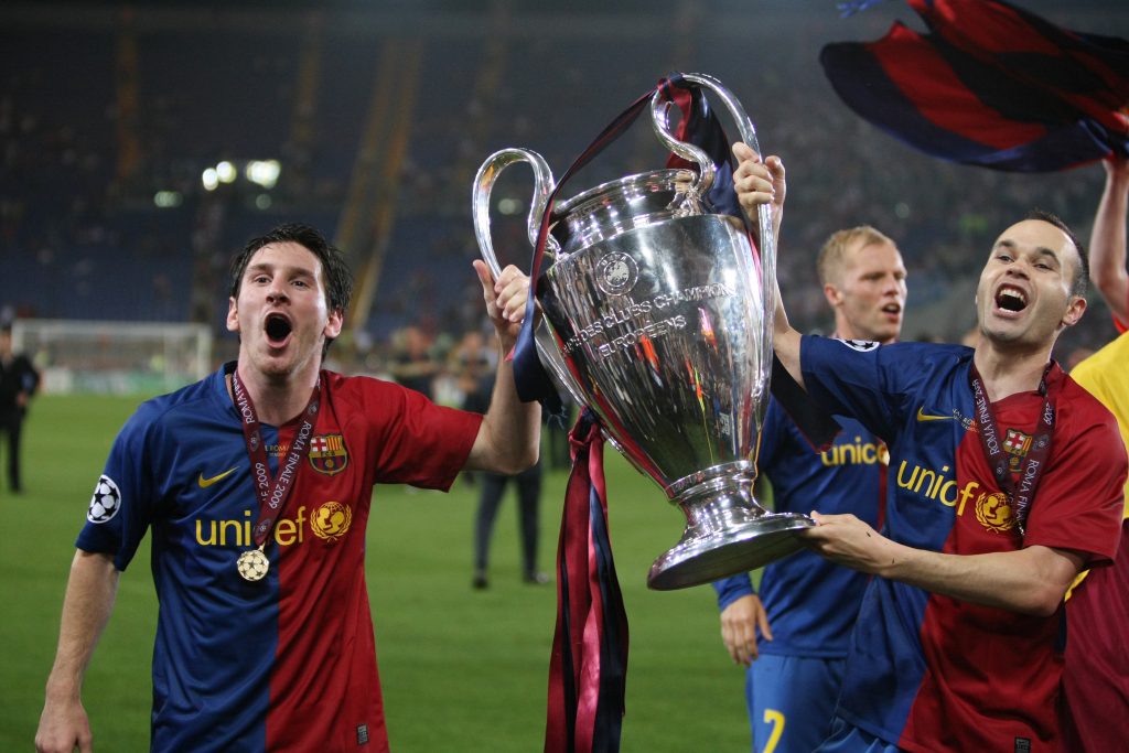 ليونيل ميسي - أندريس إنييستا - المصدر (Getty images)