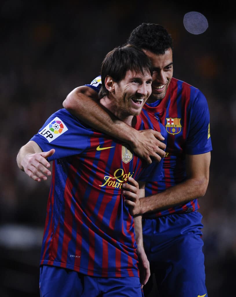 Busquets y Messi