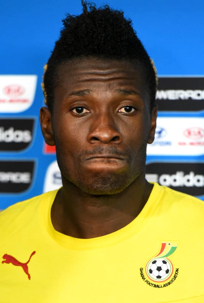 Asamoah Gyan of Ghana is interviewed after the 1-2 defeat in the 2014 FIFA World Cup Brazil Group G match between Portugal and Ghana