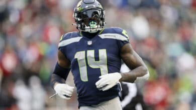 SEATTLE, WASHINGTON - DECEMBER 05: DK Metcalf #14 of the Seattle Seahawks looks on during the third quarter against the San Francisco 49ers at Lumen Field on December 05, 2021 in Seattle, Washington.