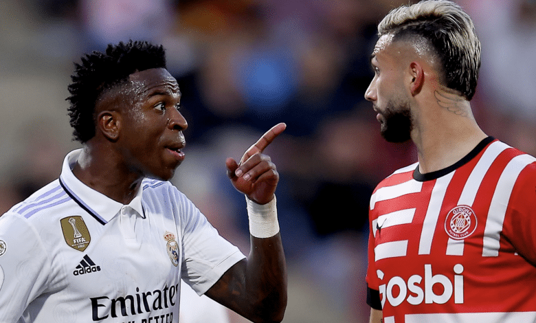 GIRONA, SPAIN - APRIL 25: Vinicius Junior of Real Madrid argue with Valentin Castellanos of Girona FC during the LaLiga Santander match between Girona FC and Real Madrid CF at Montilivi Stadium on April 25, 2023 in Girona, Spain.