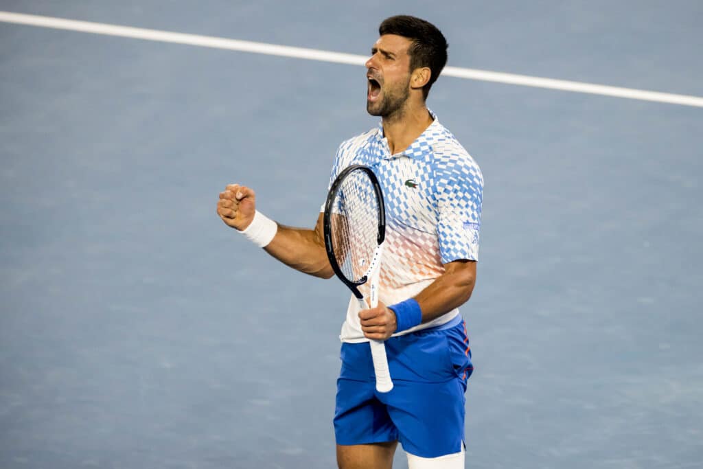 MELBOURNE, VIC - JANUARY 25: Novak Djokovic of Serbia celebrates during the Quarterfinals of the 2023 Australian Open on January 25 2023, at Melbourne Park in Melbourne, Australia.