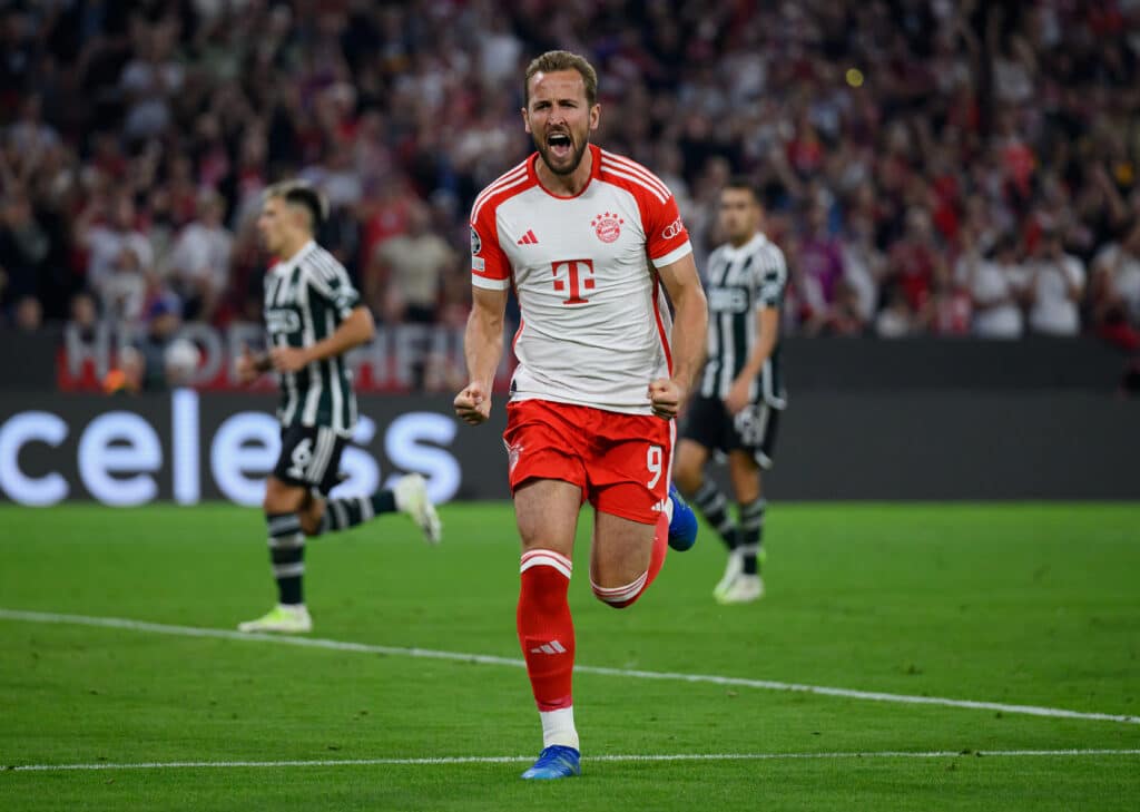 MUNICH, GERMANY - SEPTEMBER 20: Harry Kane of Bayern Munich celebrates after scoring their sides third goal from the penalty spot during the UEFA Champions League match between FC Bayern München and Manchester United at Allianz Arena on September 20, 2023 in Munich, Germany.