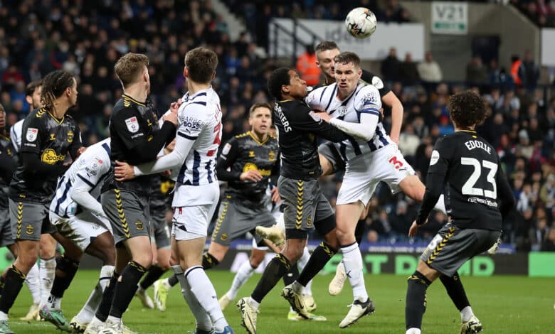 WEST BROMWICH, ENGLAND - FEBRUARY 16: Kyle Walker-Peters of Southampton Football Club holds Conor Townsend of West Bromwich Albion as he tries to jump for a header during the Sky Bet Championship match between West Bromwich Albion and Southampton FC at The Hawthorns on February 16, 2024 in West Bromwich, United Kingdom.