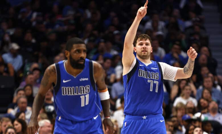 DALLAS, TX - APRIL 4: Luka Doncic #77 of the Dallas Mavericks and Kyrie Irving #11 of the Dallas Mavericks react against the Atlanta Hawks in the second half at American Airlines Center on April 4, 2024 in Dallas, Texas. NOTE TO USER: User expressly acknowledges and agrees that, by downloading and or using this photograph, User is consenting to the terms and conditions of the Getty Images License Agreement.