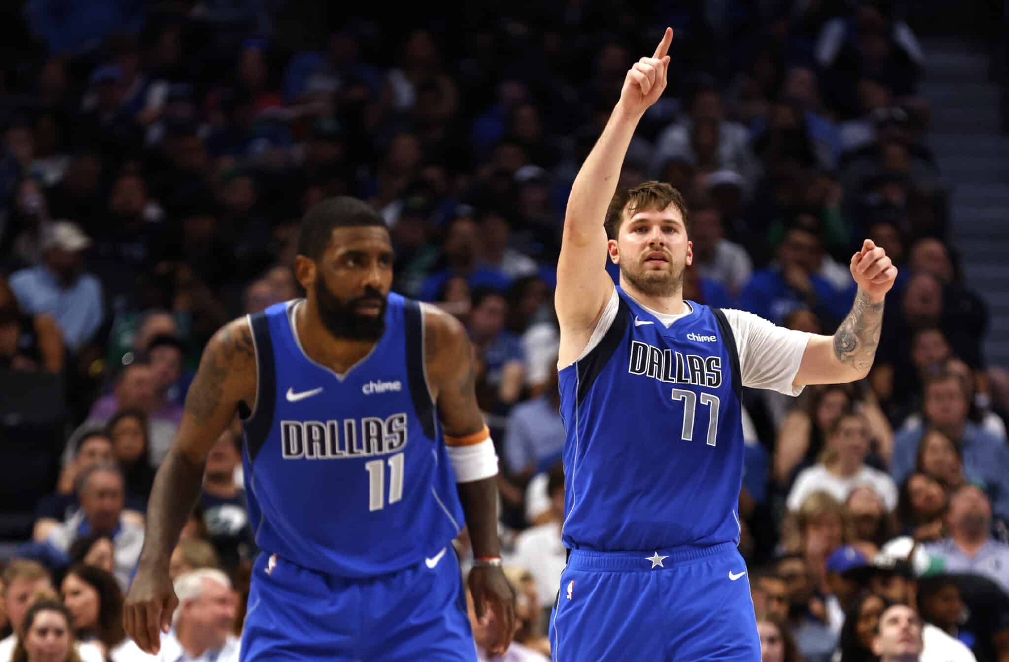 DALLAS, TX - APRIL 4: Luka Doncic #77 of the Dallas Mavericks and Kyrie Irving #11 of the Dallas Mavericks react against the Atlanta Hawks in the second half at American Airlines Center on April 4, 2024 in Dallas, Texas. NOTE TO USER: User expressly acknowledges and agrees that, by downloading and or using this photograph, User is consenting to the terms and conditions of the Getty Images License Agreement.