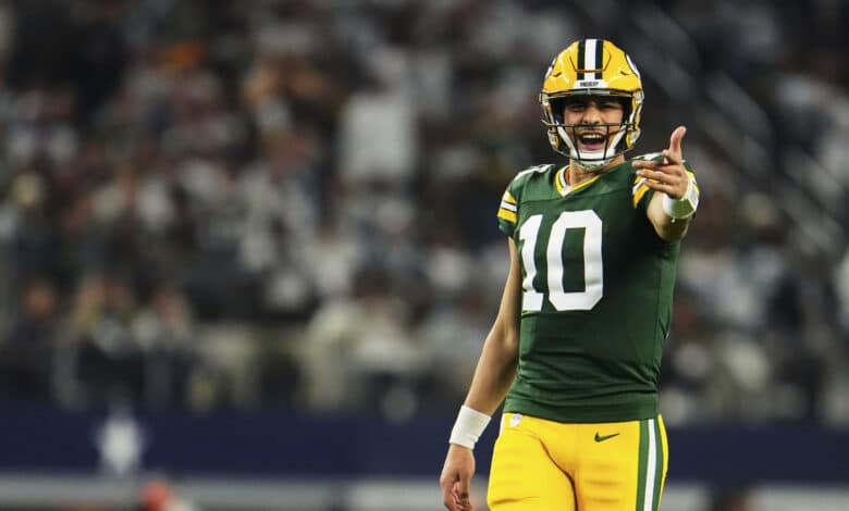 Jordan Love #10 of the Green Bay Packers reacts after a play against the Dallas Cowboys during the second half of the NFC Wild Card playoff game at AT&T Stadium on January 14, 2024 in Dallas, Texas.