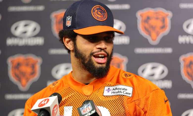 LAKE FOREST, ILLINOIS - MAY 10: Caleb Williams #18 of the Chicago Bears speaks to the media prior to Chicago Bears Rookie Minicamp at Halas Hall on May 10, 2024 in Lake Forest, Illinois.
