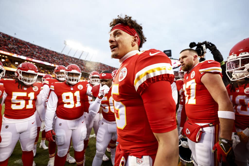 Patrick Mahomes #15 of the Kansas City Chiefs leads a huddle prior to the AFC Championship NFL football game between the Kansas City Chiefs and the Cincinnati Bengals