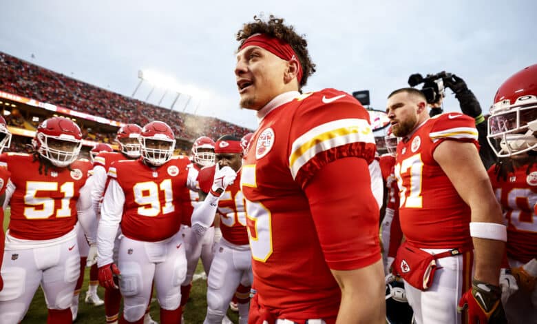 KANSAS CITY, MISSOURI - JANUARY 29: Patrick Mahomes #15 of the Kansas City Chiefs leads a huddle prior to the AFC Championship NFL football game between the Kansas City Chiefs and the Cincinnati Bengals at GEHA Field at Arrowhead Stadium on January 29, 2023 in Kansas City, Missouri.
