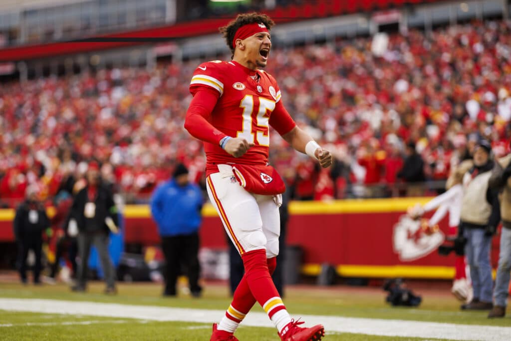 KANSAS CITY, MISSOURI - DECEMBER 31: Patrick Mahomes #15 of the Kansas City Chiefs yells and celebrates in the end zone before an NFL football game against the Cincinnati Bengals at GEHA Field at Arrowhead Stadium on December 31, 2023 in Kansas City, Missouri.