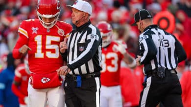 Referee Carl Cheffers speaks to Patrick Mahomes of the Kansas City Chiefs