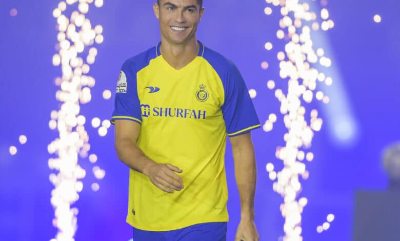 Cristiano Ronaldo smiles as he is unveiled as an Al Nassr player at Mrsool Park Stadium