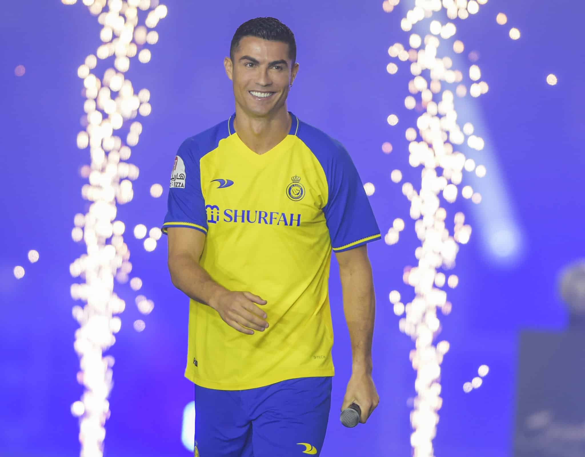 Cristiano Ronaldo smiles as he is unveiled as an Al Nassr player at Mrsool Park Stadium