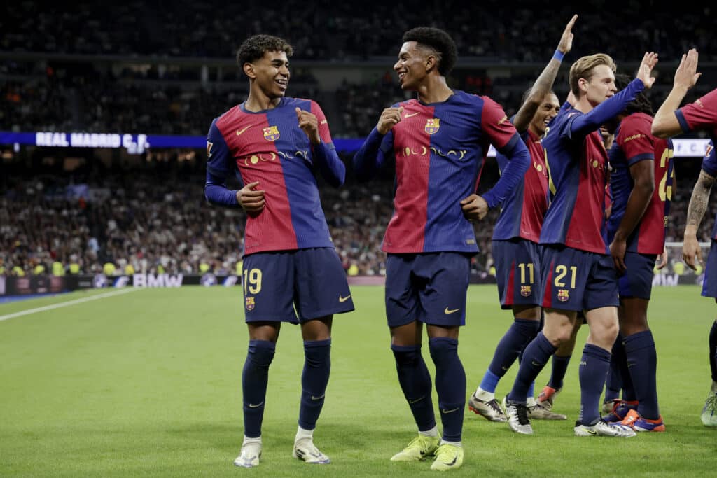Lamine Yamal of FC Barcelona celebrates 0-3 with Alejandro Balde of FC Barcelona during the LaLiga EA Sports match between Real Madrid v FC Barcelona