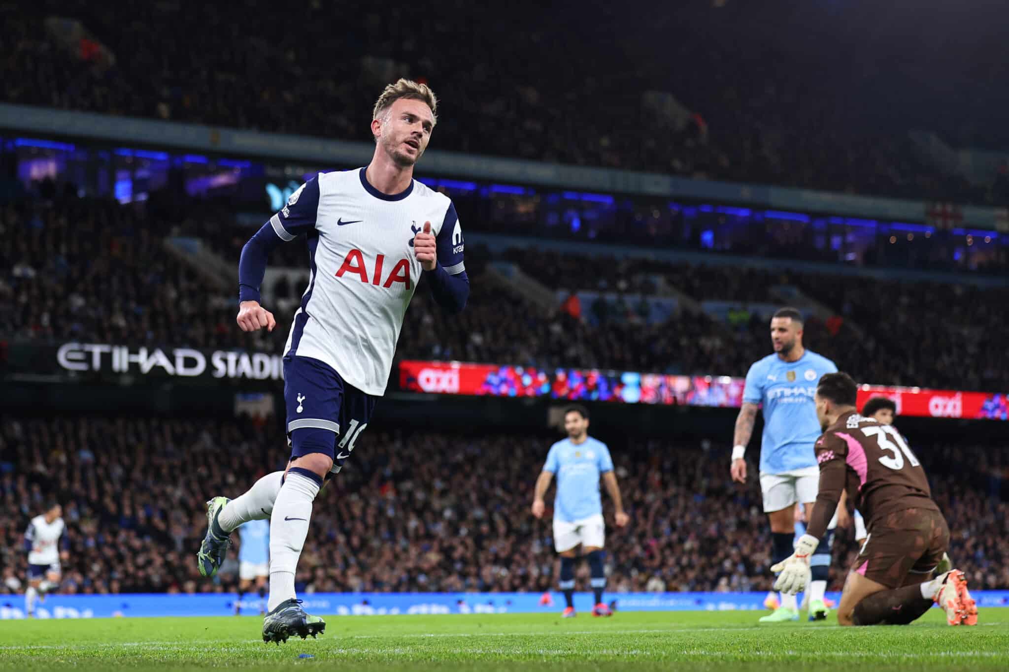 MANCHESTER, ENGLAND - NOVEMBER 23: James Maddison of Tottenham Hotspur celebrates after scoring a goal to make it 0-2 during the Premier League match between Manchester City FC and Tottenham Hotspur FC at Etihad Stadium on November 23, 2024 in Manchester, England.