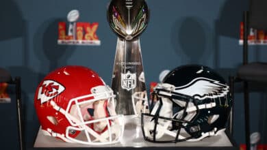 NEW ORLEANS, LOUISIANA - FEBRUARY 03: A Kansas City Chiefs helmet, the Vince Lombardi Trophy and a Philadelphia Eagles helmet are seen before the NFL Commissioner Roger Goodell's Super Bowl Press Conference ahead of Super Bowl LIX