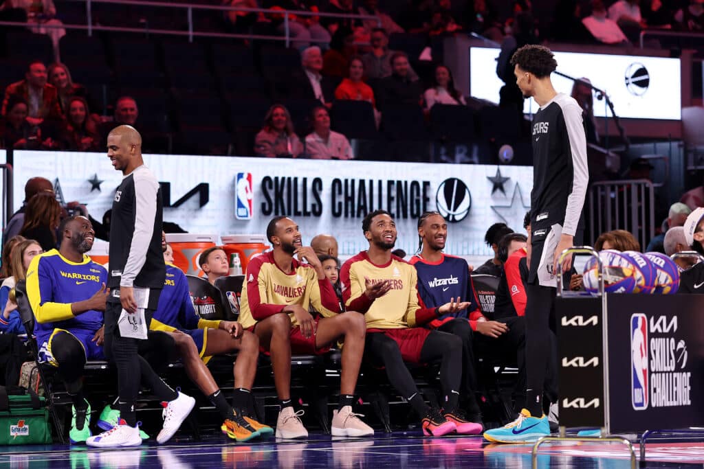 Chris Paul #3 and Victor Wembanyama #1 of the San Antonio Spurs participate during the 2025 KIA Skills Challenge