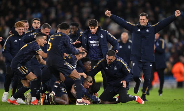MANCHESTER, ENGLAND - APRIL 17: Antonio Ruediger celebrates with teammates Toni Kroos and Vinicius Junior of Real Madrid after scoring the sides winning penalty in the penalty shoot out during the UEFA Champions League quarter-final second leg match between Manchester City and Real Madrid CF at Etihad Stadium on April 17, 2024 in Manchester, England.