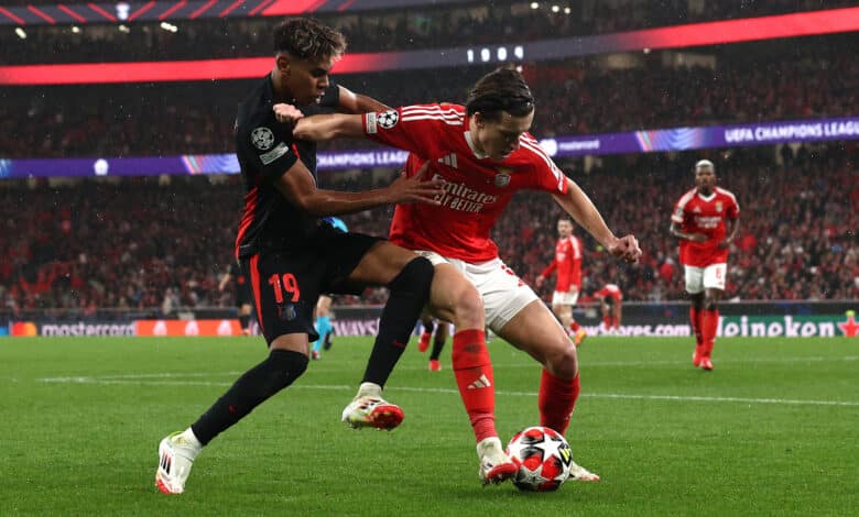 LISBON, PORTUGAL - JANUARY 21: Lamine Yamal of FC Barcelona challenges Alvaro Carreras of S.L Benfica during the UEFA Champions League 2024/25 League Phase MD7 match between SL Benfica and FC Barcelona at Estadio do SL Benfica on January 21, 2025 in Lisbon, Portugal.