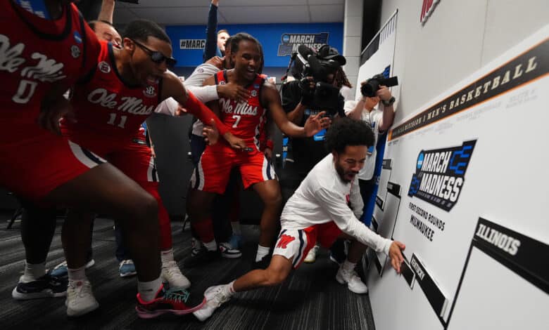 MILWAUKEE, WISCONSIN - MARCH 23: Cam Brent #55 of the Mississippi Rebels celebrates with teammates in the locker room after defeating the Iowa State Cyclones during the second round of the 2025 NCAA Men's Basketball Tournament held at Fiserv Forum on March 23, 2025 in Milwaukee, Wisconsin.