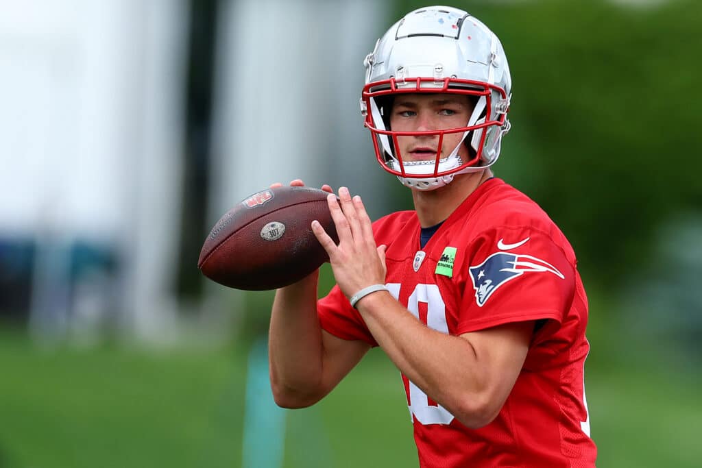 FOXBOROUGH, MASSACHUSETTS - MAY 29: Drake Maye #10 of the New England Patriots throws the ball during the New England Patriots OTA Offseason Workout on May 29, 2024 in Foxborough, Massachusetts.