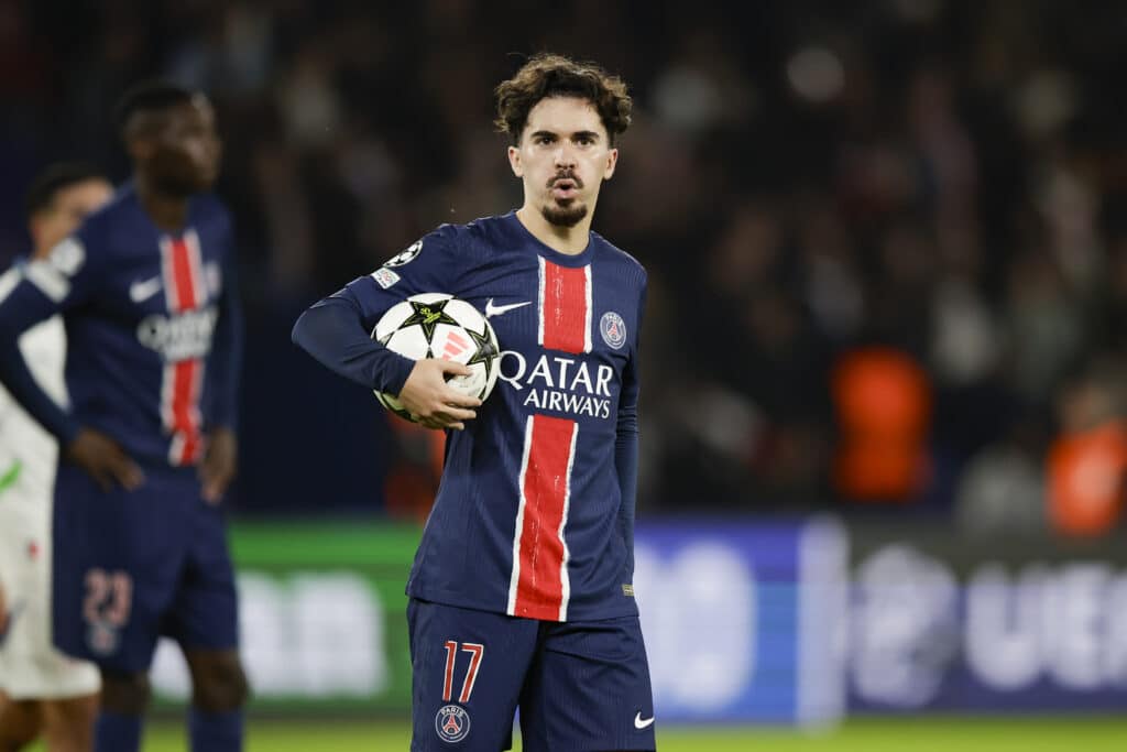 PARIS, FRANCE - OCTOBER 22: Vitor Ferreira of Paris Saint-Germain picks up the ball during the UEFA Champions League 2024/25 League Phase MD3 match between Paris Saint-Germain and PSV Eindhoven at Parc des Princes on October 22, 2024 in Paris, France.