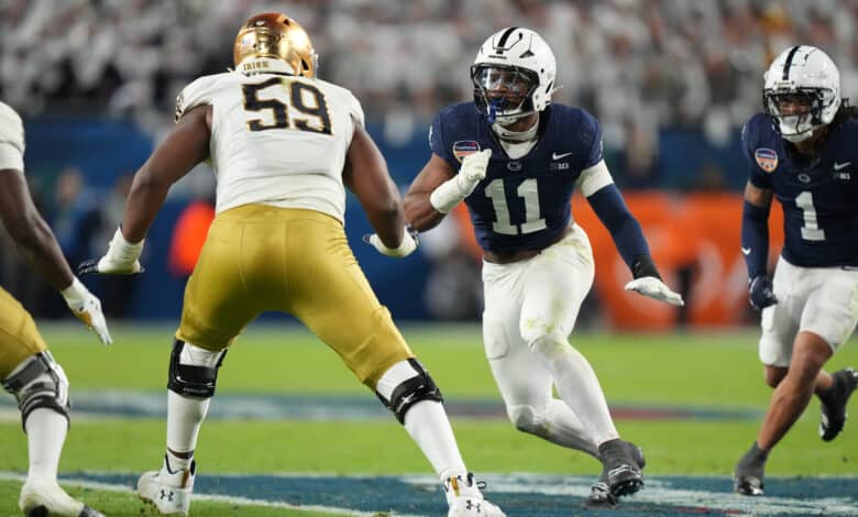 MIAMI GARDENS, FL - JANUARY 09: Penn State Nittany Lions defensive end Abdul Carter (11) rushes the passer during the Penn State Nittany Lions versus Notre Dame Fighting Irish College Football Playoff Semifinal at the Capital One Orange Bowl on January 9, 2025, at Hard Rock Stadium in Miami Gardens, FL.