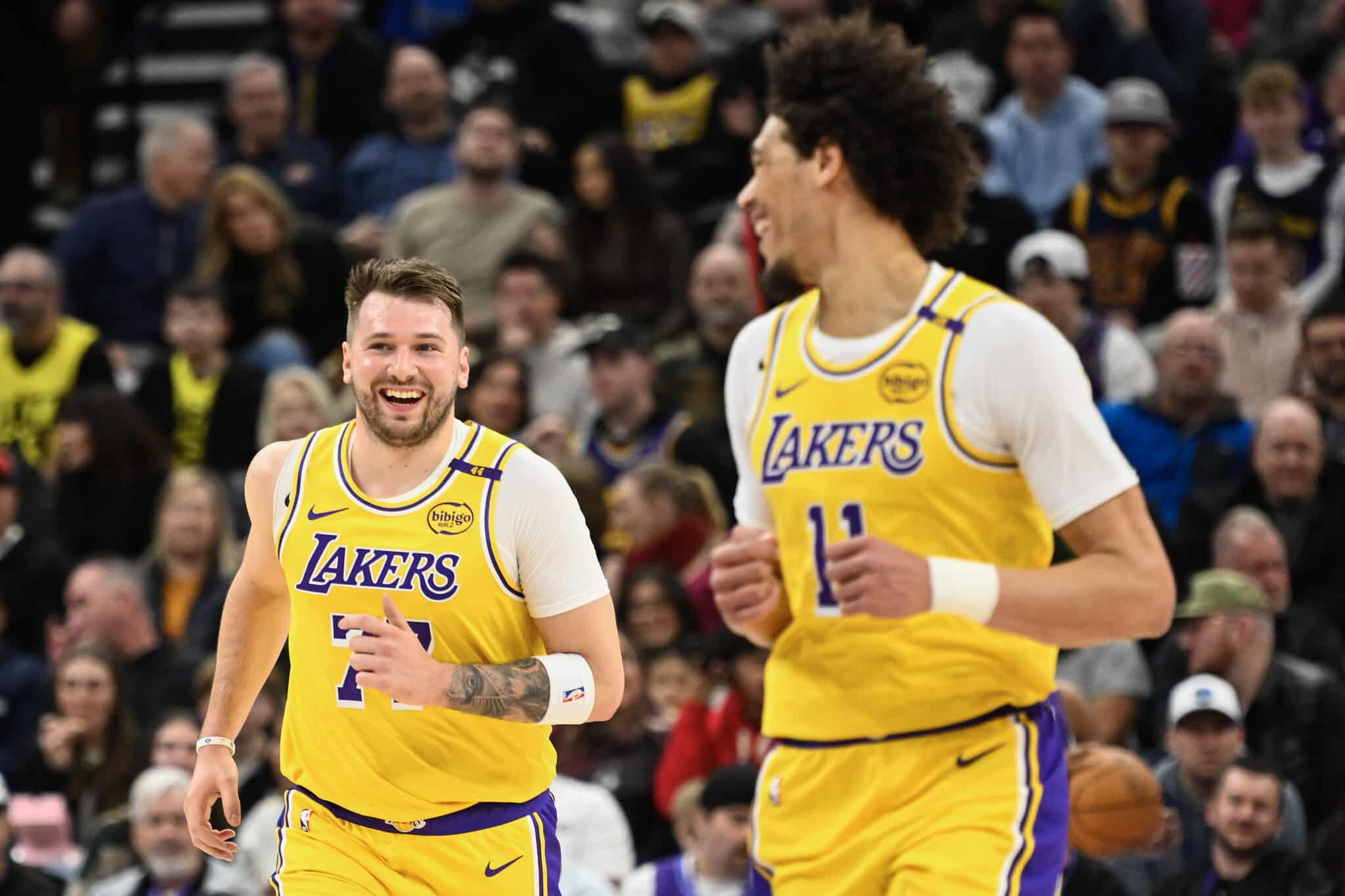 SALT LAKE CITY, UTAH - FEBRUARY 12: Luka Doncic #77 of the Los Angeles Lakers celebrates a play during the first half of a game against the Utah Jazz at Delta Center on February 12, 2025 in Salt Lake City, Utah.