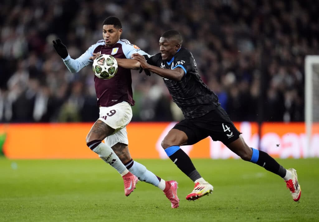 Aston Villa's Marcus Rashford and Club Brugge's Joel Ordonez (right) battle for the ball during the UEFA Champions League round of sixteen second leg match at Villa Park, Birmingham. Picture date: Wednesday March 12, 2025.
