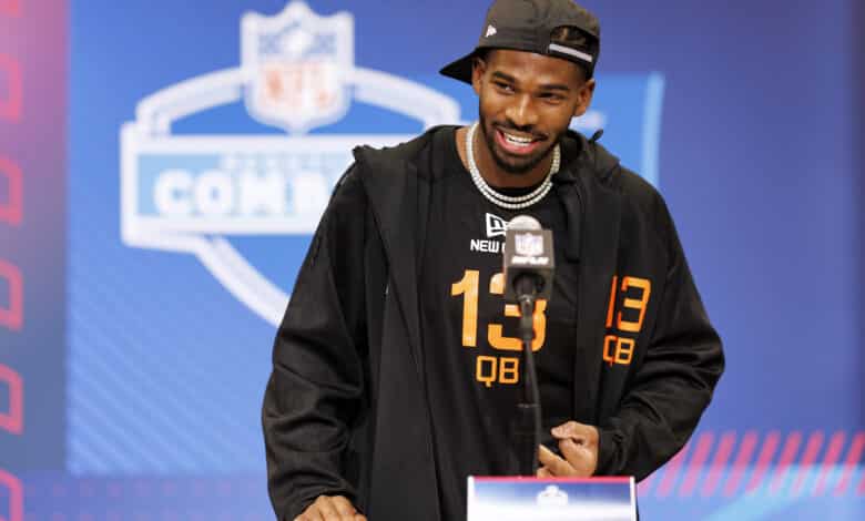 INDIANAPOLIS, INDIANA - FEBRUARY 28: Shedeur Sanders #QB13 of Colorado speaks at the podium during the 2025 NFL Combine at the Indiana Convention Center on February 28, 2025 in Indianapolis, Indiana.