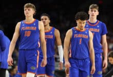 SAN ANTONIO, TEXAS - APRIL 05: Thomas Haugh #10, Will Richard #5 and Walter Clayton Jr. #1 of the Florida Gators react against the Auburn Tigers during the second half in the Final Four game of the NCAA Men's Basketball Tournament at the Alamodome on April 05, 2025 in San Antonio, Texas.