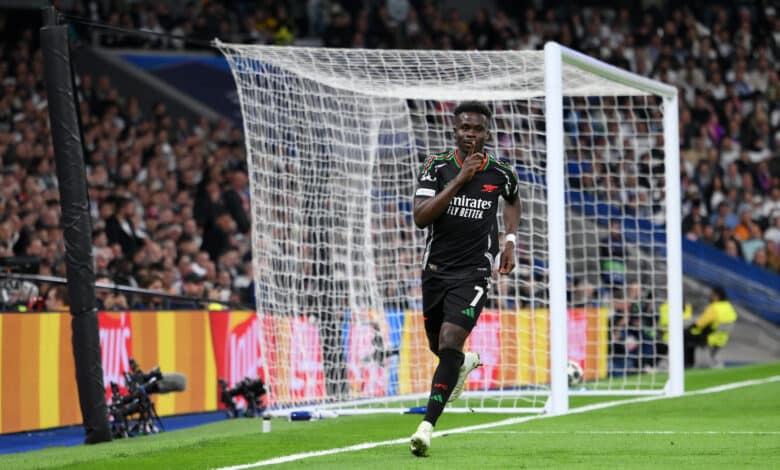 MADRID, SPAIN - APRIL 16: Bukayo Saka of Arsenal celebrates scoring his team's first goal during the UEFA Champions League 2024/25 Quarter Final Second Leg match between Real Madrid C.F. and Arsenal FC at Estadio Santiago Bernabeu on April 16, 2025 in Madrid, Spain.