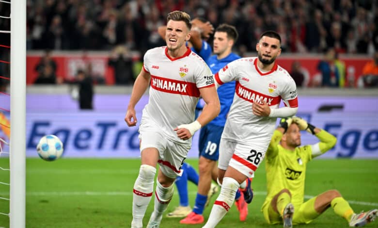 The Stuttgart players with scorer Ermedin Demirovic and Deniz Undav celebrate the 1:1 goal in stoppage time together, with beaten Hoffenheim.
