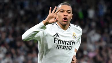 MADRID, SPAIN - FEBRUARY 19: Kylian Mbappe of Real Madrid celebrates scoring his team's third goal and his hat trick with teammate Jude Bellingham during the UEFA Champions League 2024/25 League Knockout Play-off second leg match between Real Madrid C.F. and Manchester City at Santiago Bernabeu Stadium on February 19, 2025 in Madrid, Spain.