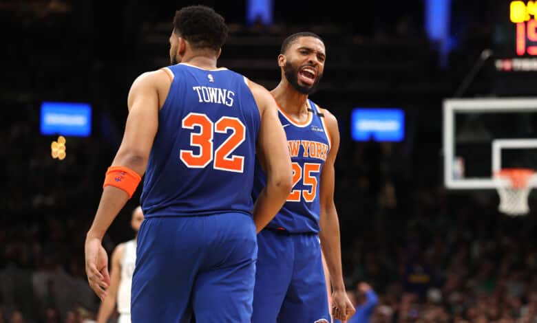 Mikal Bridges #25 of the New York Knicks celebrates with Karl-Anthony Towns #32 during the second half against the Boston Celtics