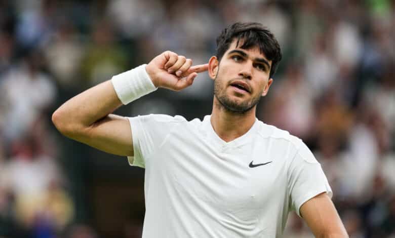 LONDON, ENGLAND - JULY 09: Carlos Alcaraz of Spain reacts in the Men's Singles quarter finals match against Tommy Paul of the United States during day nine of The Championships Wimbledon 2024 at All England Lawn Tennis and Croquet Club on July 09, 2024 in London, England.