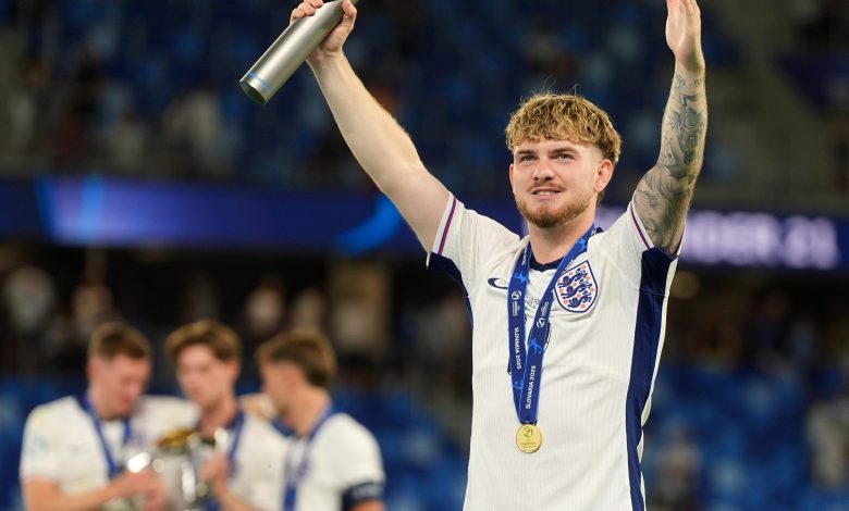 Harvey Elliott of England celebrates with his Player of the Tournament award