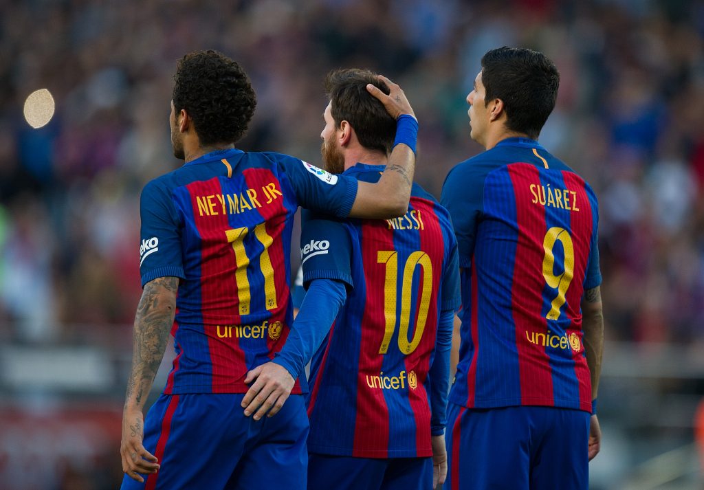 BARCELONA, SPAIN - MAY 06:  Lionel Messi of FC Barcelona celebrates with Neymar and Luis Suarez after scoring his team's 3rd goal from the penalty spot during of the La Liga match between FC Barcelona and Villarreal CF at Camp Nou stadium on May 6, 2017 in Barcelona, Spain.  