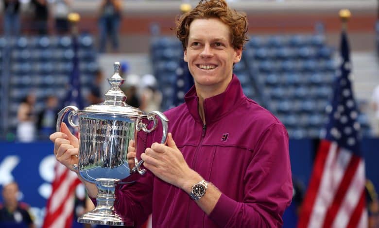 Jannik Sinner of Italy celebrates with the winners trophy after defeating Taylor Fritz of the United States to win the Men's Singles Final on Day Fourteen of the 2024 US Open