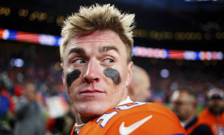 DENVER, CO - JANUARY 5: Quarterback Bo Nix #10 of the Denver Broncos walks off the field after a 38-0 win against the Kansas City Chiefs at Empower Field at Mile High on January 5, 2025 in Denver, Colorado.