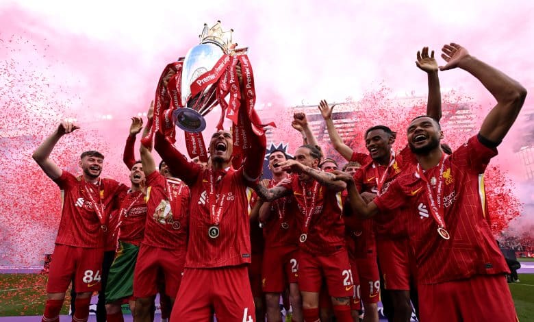 Virgil van Dijk of Liverpool, lifts the Premier League trophy