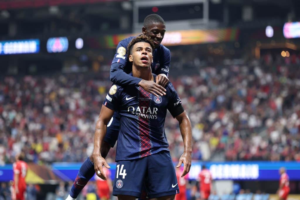 Super Cip - ATLANTA, GEORGIA - JULY 05: Desire Doue #14 of Paris Saint-Germain celebrates scoring his team's first goal with teammate Ousmane Dembele #10 during the FIFA Club World Cup 2025 quarter-final match between Paris Saint-Germain and FC Bayern München at Mercedes-Benz Stadium on July 05, 2025 in Atlanta, Georgia.