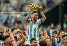 Lionel Messi of Argentina lifts the trophy