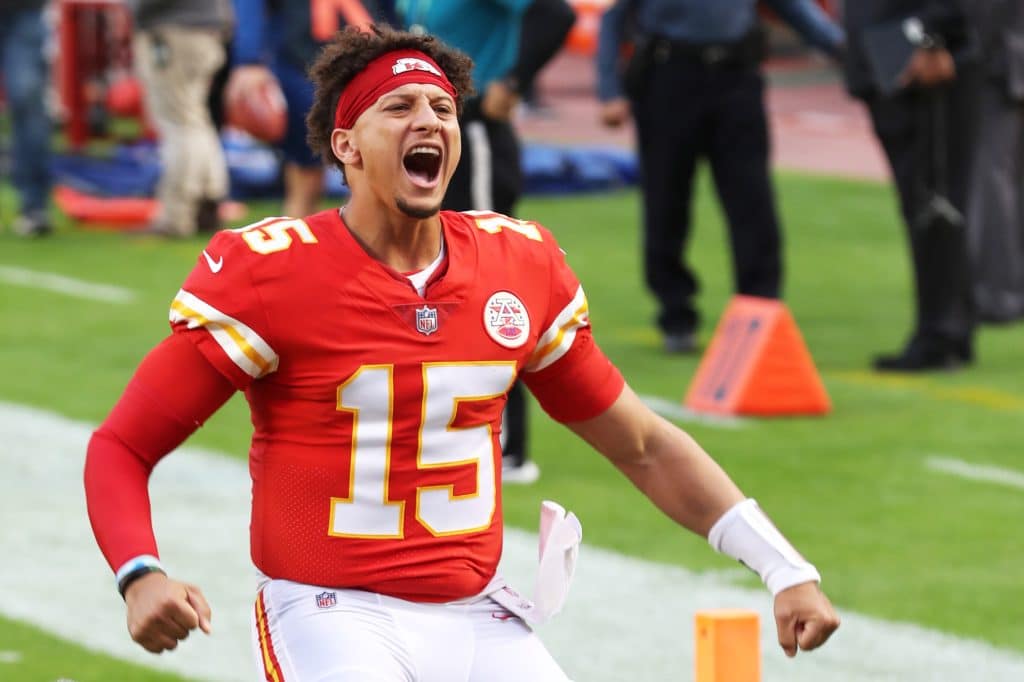 KANSAS CITY, MISSOURI - OCTOBER 05: Patrick Mahomes #15 of the Kansas City Chiefs is announced before the game against the New England Patriots at Arrowhead Stadium on October 05, 2020 in Kansas City, Missouri.