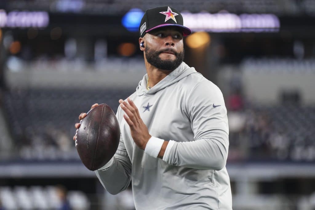 ARLINGTON, TX - OCTOBER 01: Dak Prescott #4 of the Dallas Cowboys warms up at AT&T Stadium on October 1, 2023 in Arlington, Texas.