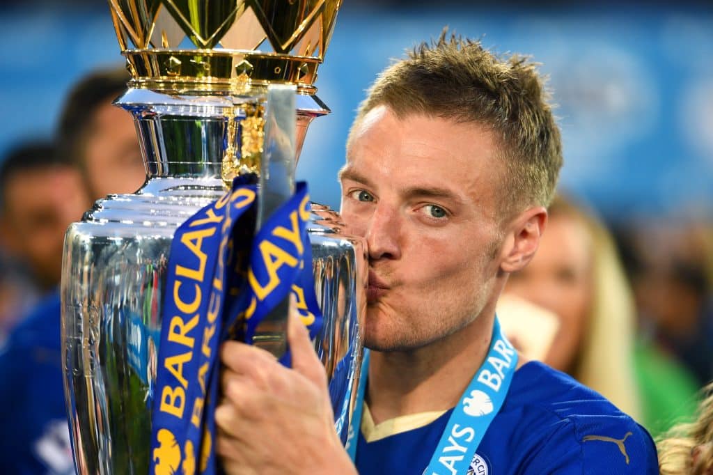 LEICESTER, ENGLAND - MAY 07: Jamie Vardy of Leicester City kisses the Premier League Trophy after the Barclays Premier League match between Leicester City and Everton at The King Power Stadium on May 7, 2016 in Leicester, United Kingdom.
