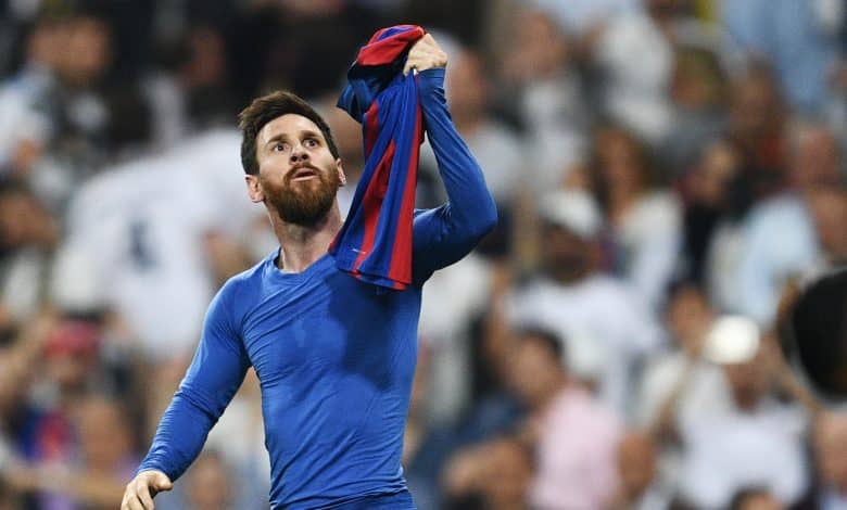 MADRID, SPAIN - APRIL 23: Lionel Messi of Barcelona celebrates as he scores their third goal during the La Liga match between Real Madrid CF and FC Barcelona at Estadio Bernabeu on April 23, 2017 in Madrid, Spain.